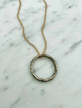 Load image into Gallery viewer, Handmade silver necklace, silver and gold, rustic elegance, punk inspired, mixed metal necklace, shop online, free shipping, circle pendant, silver and gold necklace, mixed metal jewelry, hammered silver necklace, silver circle pendant 