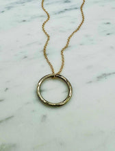 Load image into Gallery viewer, Handmade silver necklace, silver and gold, rustic elegance, punk inspired, mixed metal necklace, shop online, free shipping, circle pendant, silver and gold necklace, mixed metal jewelry, hammered silver necklace, silver circle pendant 