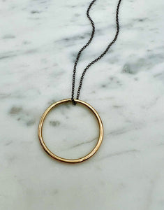 Large Gold Circle Pendant on Black Silver Necklace