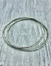 Load image into Gallery viewer, silver bangle bracelet, handmade silver bangle, oxidized silver bracelet, textured silver bracelet, handmade texture bangle, boho chic, Southwest chic, desert inspired silver jewelry, Southwest inspired jewelry, western silver bangle, cowgirl chic, cowgirl fashion, silver, cowgirl style